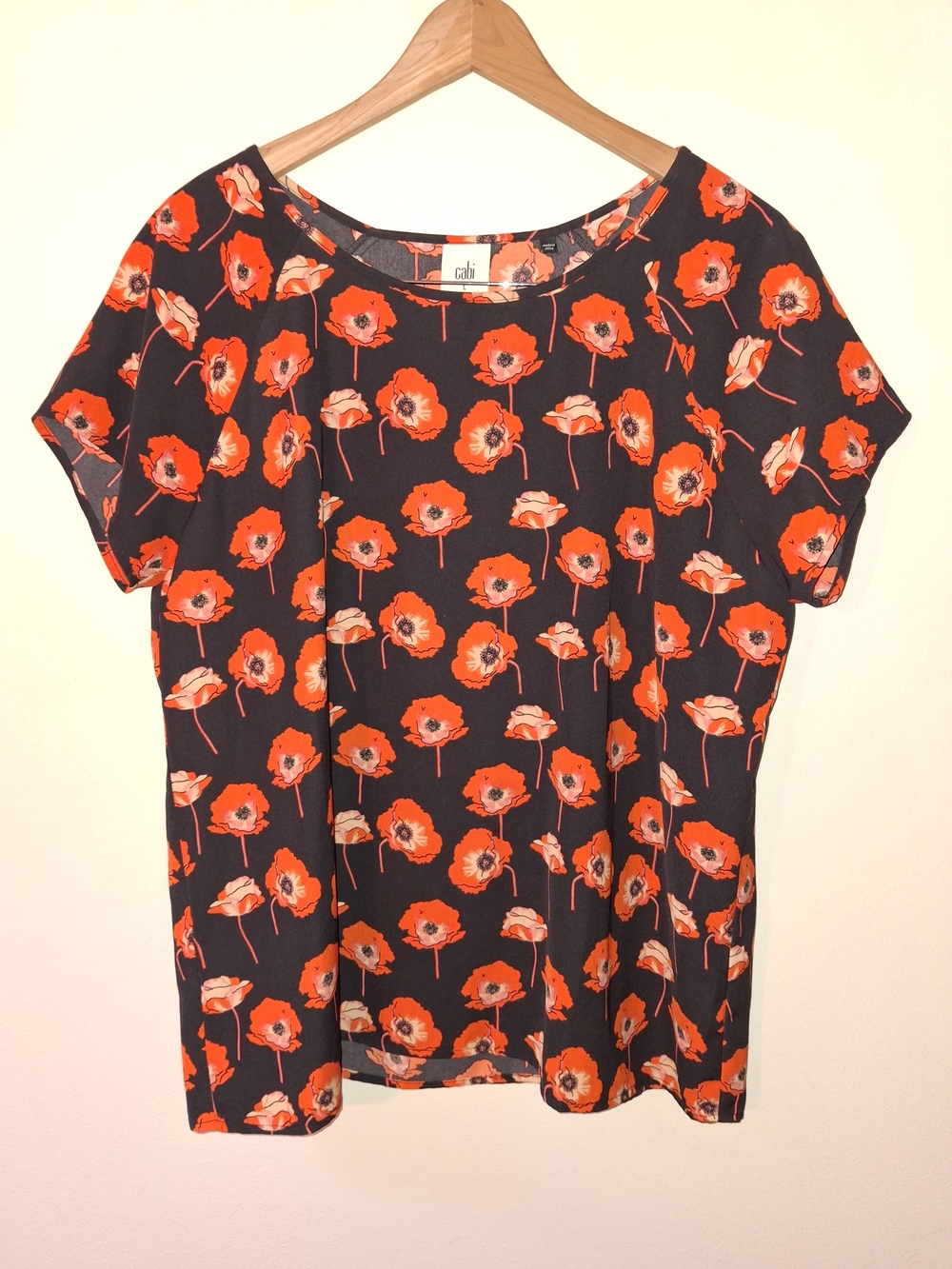 CAbi Black Top with Bright Red-Orange Floral Print